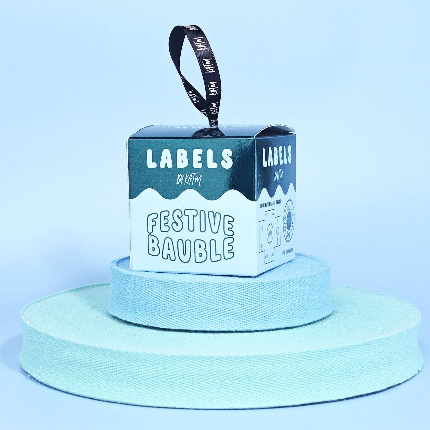 Kylie and The Machine Festive Bauble Limited Edition Labels | Green & Blue Box